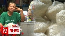 Plastic-for-rice exchange feeds hungry Filipino village