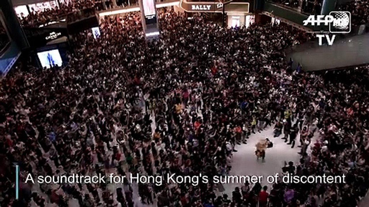 HK demonstrators rock new protest anthem