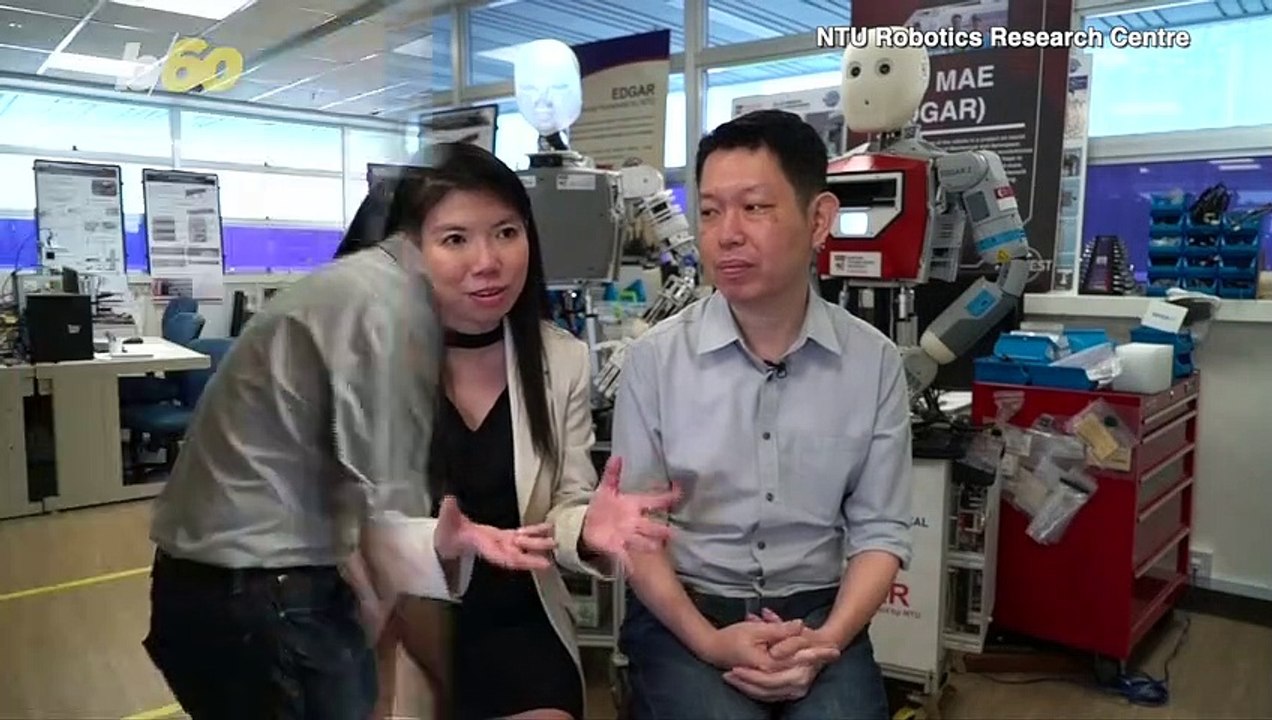 Robot-Designing Couple Welcomes Own Human Creation
