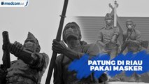 Patung di Riau Pakai Masker