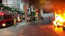 Firefighters put out blaze lit by Hong Kong protesters at Wan Chai station