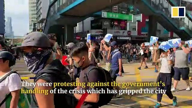 Fires burn in Hong Kong as protesters clash with police in Admiralty