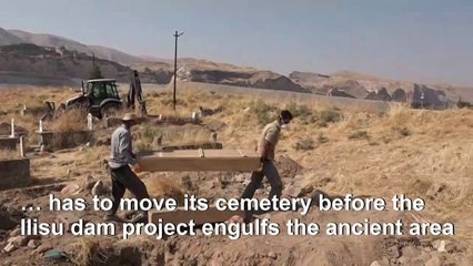 Displacement of graves before flooding of Turkish town