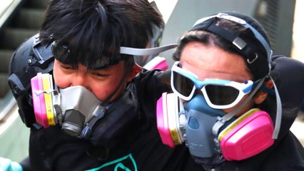 Hong Kong violence flares after banned march