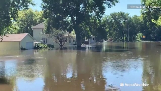 Neighborhood left underwater following river flooding