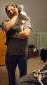 Adorable Cat Repeatedly Jumps from Bed to Hug Owner