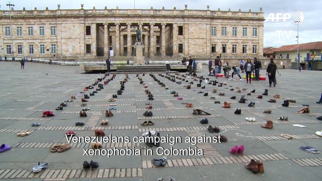 Venezuelans display hundreds of migrant shoes against xenophobia