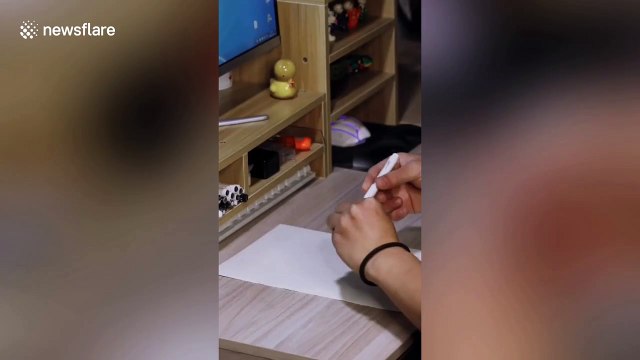 Chinese artist draws impressive portraits with one continuous spiral