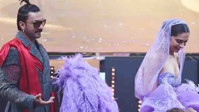 Deepika Padukone's husband Ranveer Singh adjust her gown during IIFA awards; Check out | FilmiBeat