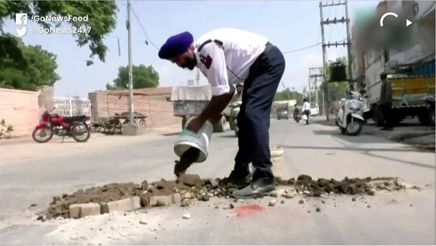 Punjab Traffic Policeman Earns Praise For Filling Potholes