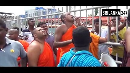 Protest by the disabled soldier who climbed an electric lamp post