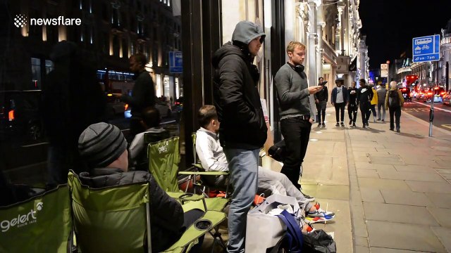 iPhone enthusiasts queue all night at London's flagship Apple store for new release
