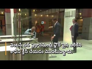 Dutch PM Mark Rutte dropped his coffee, then cleaned up the floor