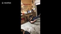 Man loses both balance and beer attempting to balance on board while shotgunning a beer