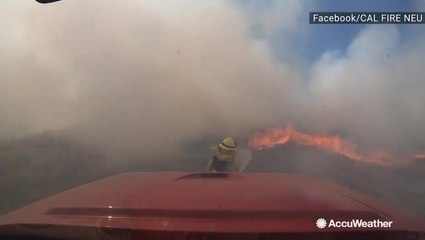 Up-close with firefighters as they combat a wildfire
