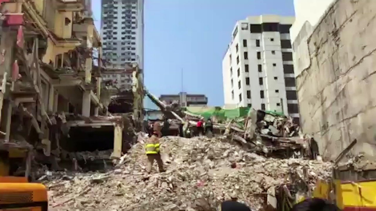 Footage of rescue operation at collapsed hotel building in Manila