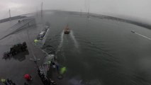 HMS Prince of Wales sails under Forth bridges