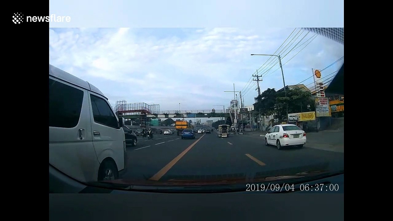 Filipino cyclists have lucky escape after colliding on busy road