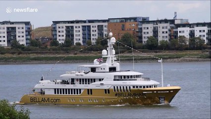Golden superyacht worth £16m cruises down River Thames during London Fashion Week