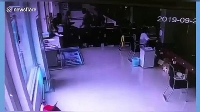 Car smashes into garage in China after driver presses accelerator by mistake