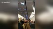 Shocking scene as American Airlines passenger tries smoking weed mid-flight causing emergency landing