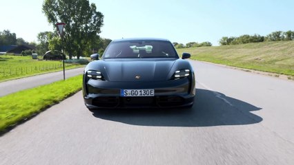 The new Porsche Taycan Turbo in Volcano Grey Metallic Driving Video