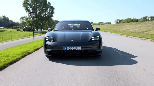 The new Porsche Taycan Turbo in Volcano Grey Metallic Driving Video