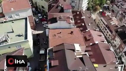 Depremde temeli yan yatan bina drone ile görüntülendi