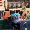 Gymnastics Coach Rolls Over Uneven Bars and Falls While Helping a Girl