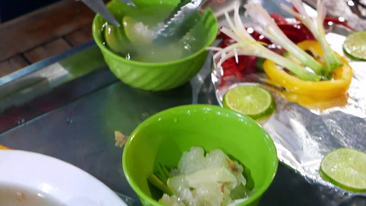 Vietnamese street food - live lobster sashimi garlic yellow fried lobster