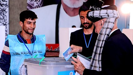 Afghan election beset by low turnout, technical glitches