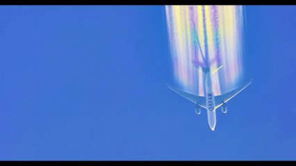 Airplane Leaves Amazing Rainbow Contrails Overhead