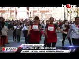 Lomba Unik Adu Cepat Bawa Minuman Tanpa Tumpah