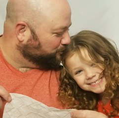 This single dad learned how to do hair for his daughter