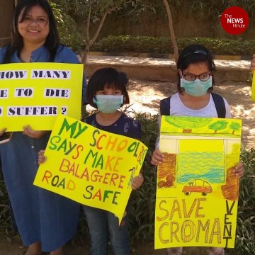 Children join their parents in protests against bad roads, traffic jams in Bengaluru
