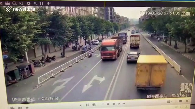 Five-storey building bursts into flames after out-of-control truck crashes into it in China