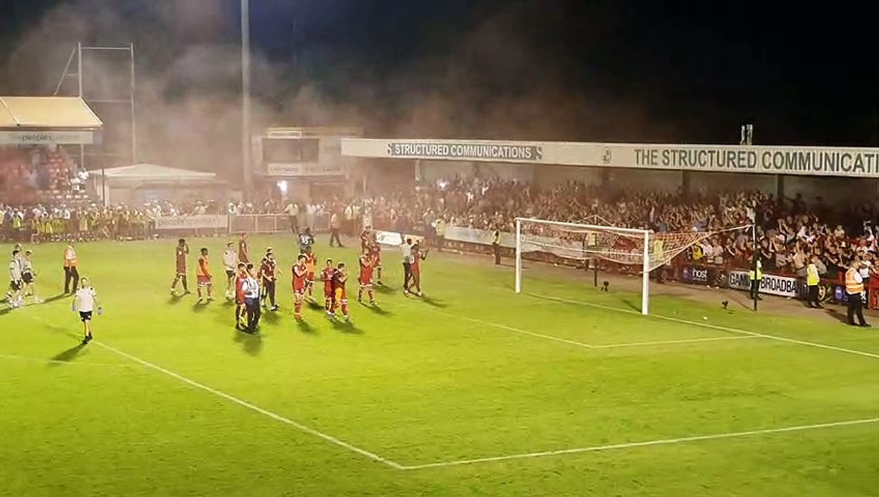 Crawley Town players and fans celebrate win against Norwich City