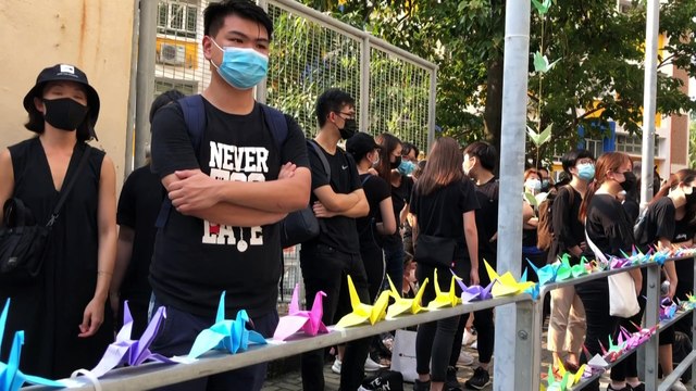 Sit-in at school of Hong Kong protester shot by police