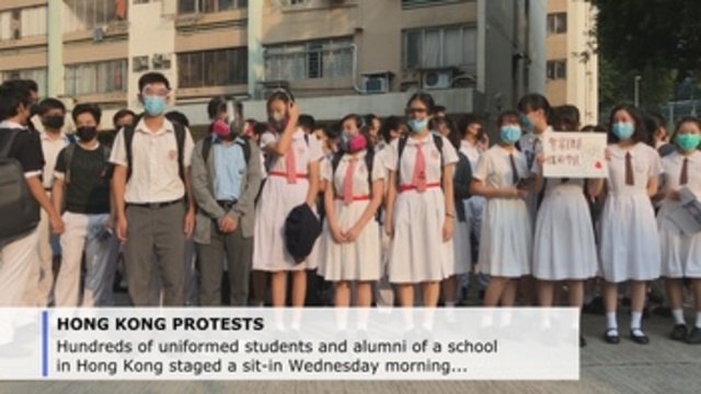 Classmates of Hong Kong protester shot by police stage sit-in