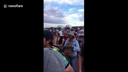 Thousands flock to Uluru for final chance to scale the sacred rock before climbing ban is enforced