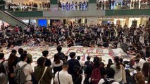 Kneeling Hong Kong protestors create huge origami mural in shopping mall
