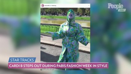 Cardi B Steps Out During Paris Fashion Week in Revealing Purple Latex Outfit