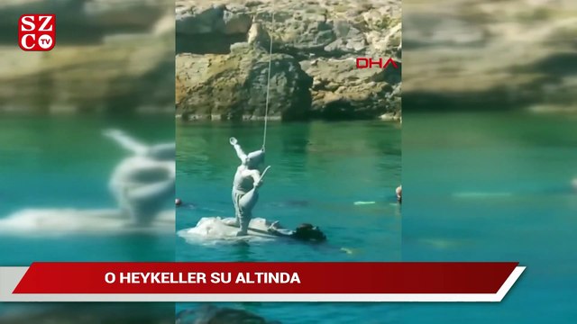 Su altında Pir Sultan Abdal ve Hacı Bektaş-ı Veli heykelleri