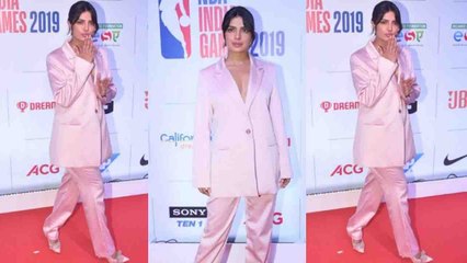 Priyanka Chopra makes stylish entry at NBA party in loose pantsuit; Watch video | FilmiBeat