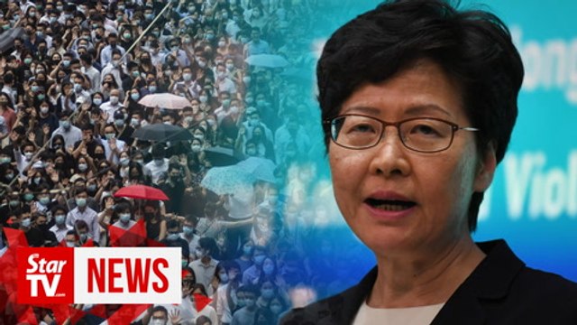 Hong Kong leader announces ban on protester face masks