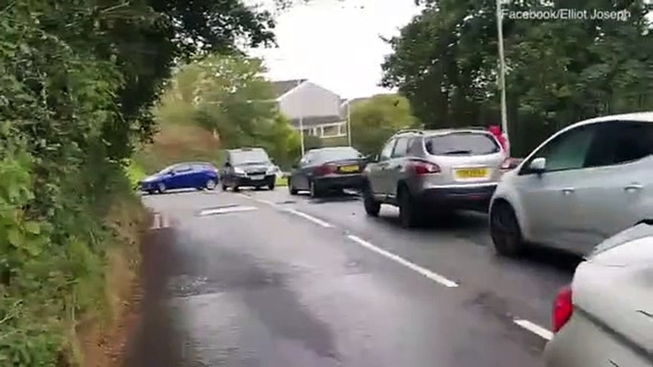 Cyclist chastises BMW driver for causing gridlock by blocking a bus