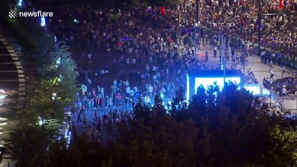 Thousands of tourists flock to the Bund in Shanghai during the China's national holidays