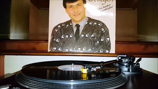 Ferdi Özbeğen - Dün Geceki Yağmurda ( Plak kayıt)