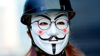 Hong Kong protesters rally against ban on wearing masks