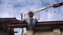 Karaman mühürlenen iş yerinin çatısına çıktı